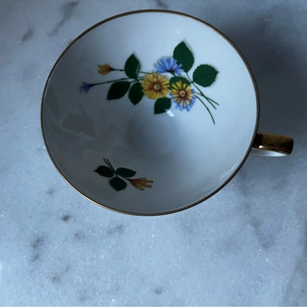 Elegant White floral Teacup with Gold Trim